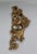 A substantial horizontal gilt scroll swag, cast in resin with deep, sculptural acanthus leaf and scrollwork relief...