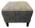 Elevate your living space with the premium craftsmanship of this square accent ottoman by heritage furniture maker Ethan...
