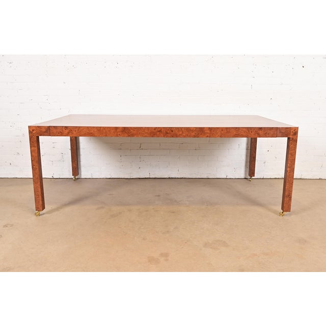 An exceptional Mid-Century Modern Parsons dining table, executive desk, or library table In the manner of Milo Baughman...