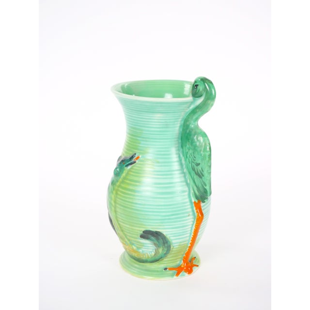 A distinctive Burleigh Ware ceramic pitcher, made in England in the mid-20th century, showcasing an imaginative sculptural...