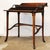 English Edwardian metamorphic writing table / desk, dating to circa 1905, with elegant Art Nouveau influence. Cleverly...