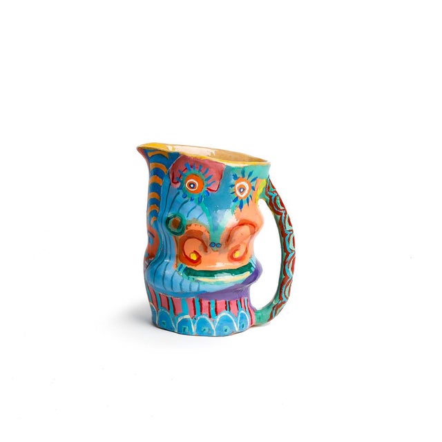 Ceramic jug hand painted with enamel created by Uruguay Artist Alfonso Reyes. At trobar we use it to serve our Sangria....