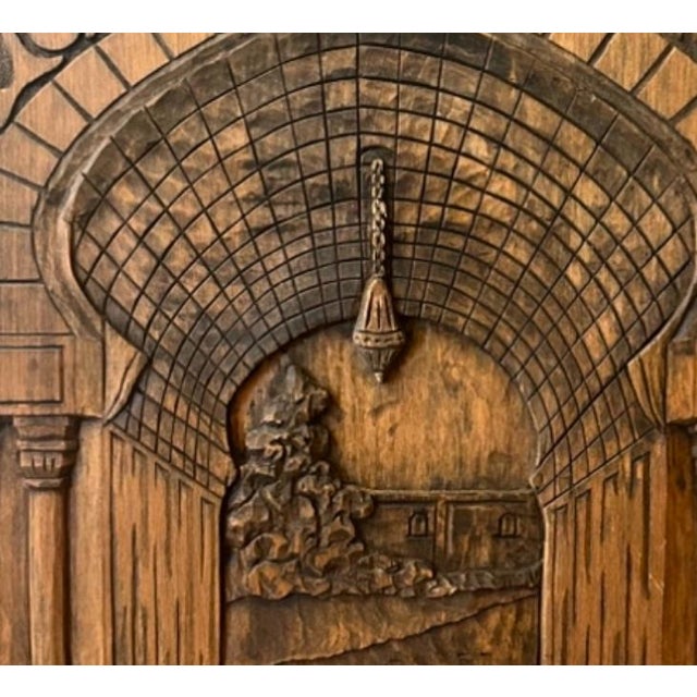 This vintage Moroccan hand carved wall relief art is extremely unique and intricate. It seems to depict some kind of...