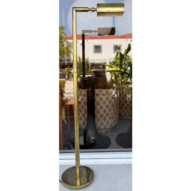 Elegant and timeless Midcentury Modern style reading lamp by Waso. Made of thick solid brass with brass socket and...