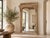 This is a truly special piece – a mirror that carries the weight of architectural history. Crafted from an antique Indian...