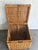 1970s chinoiserie wicker hinge-top storage trunk/chest w/ brass handle, corner and latch accents. Some minor fading to...
