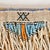 The Xhosa beaded apron is a richly symbolic artifact that embodies the cultural identity, aesthetic values, and social...
