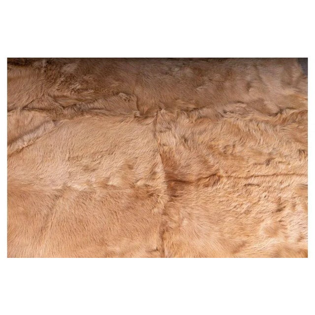 Rectangular rug in Chinese goatskin MEASURES Width 170cm Depth 220cm