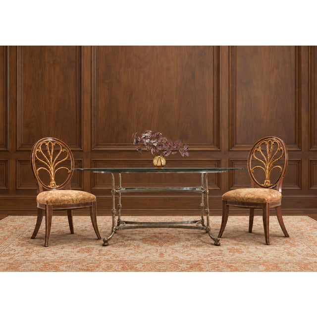 An elegant set of four "Feather" dining side chairs designed by Rose Tarlow and finished in Fortuny fabric upholstery. The...