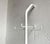 Minimalist wardrobe. This design is hard to beat in terms of simplicity and functionality. An angled tube made of white...
