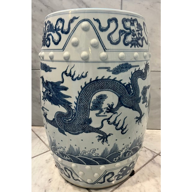 Gorgeous set of Chinese blue and white porcelain garden stools with hand painted chinoiserie scenes. Use in the garden or...
