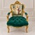 Make a statement with this ornate French-style armchair, featuring rich green velvet upholstery and an elaborately carved...