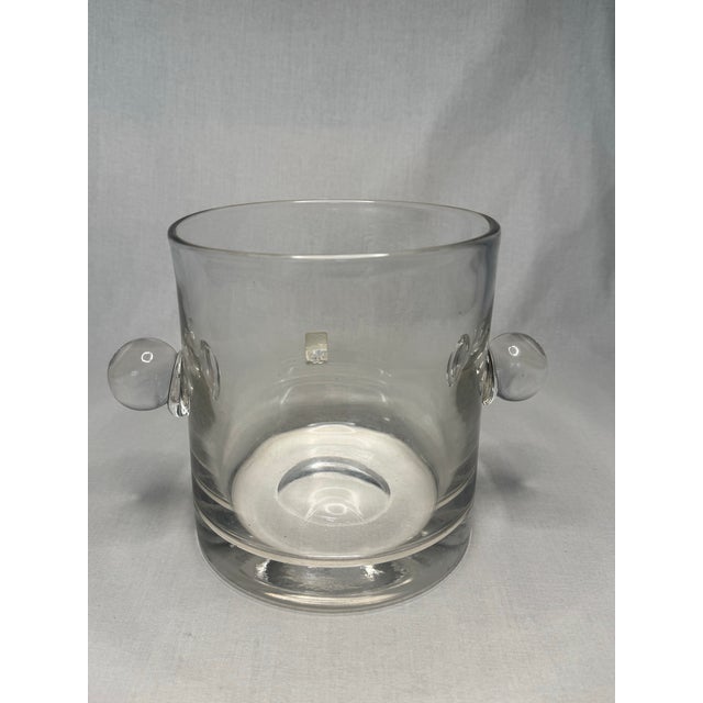 In the style of Tiffany & Co. this handmade glass ice bucket is hand crafted from Spain and is sure to be an attractive...