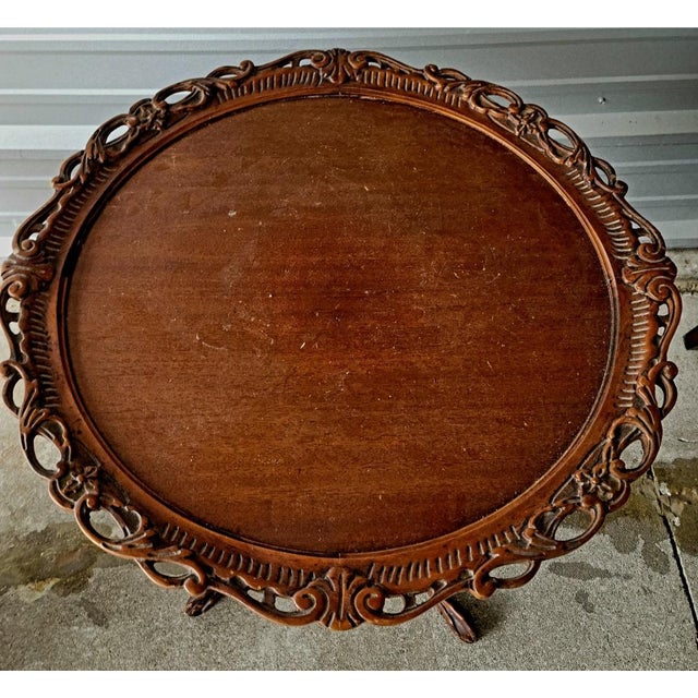 Detailed carved table from the 1940's. Beautifully maintained and been in same family since then.