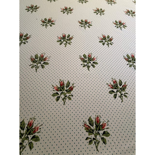23 yards of hand print fabric entitled Rosebud from Cowtan & Tout featuring a white background with red and pink roses on...