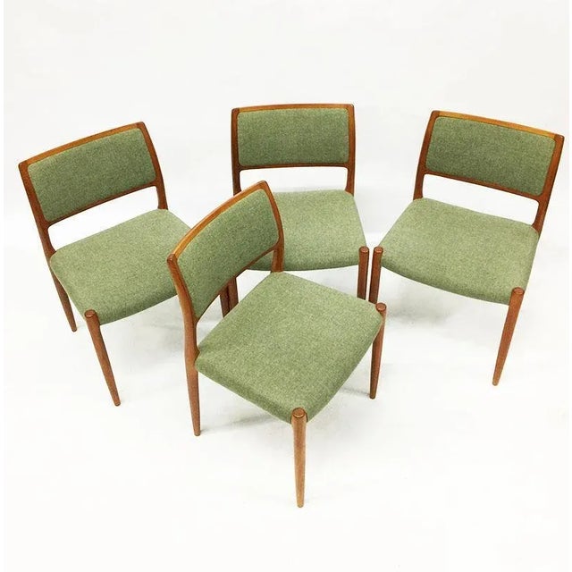 4 Dining chairs model 80 by Niels Otto Møller for J.L. Møller-Højbjerg, Denmark Teak chairs with fabric wool upholstery...