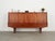 The highboard was made in the 1960s, Danish production. The structure is covered with teak veneer. The legs are made of...