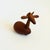 A mid century turned wood figurine in the shape of a deer. Adorable stylized features. Made in Japan by Senshukai as part...