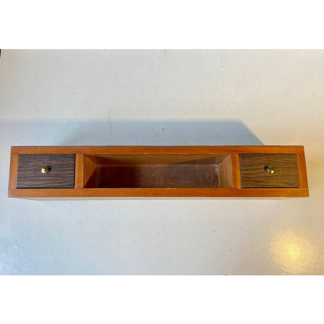 Small wall unit for your entrance way area or beneath a mirror as a practical shelf with small two drawers and one center...