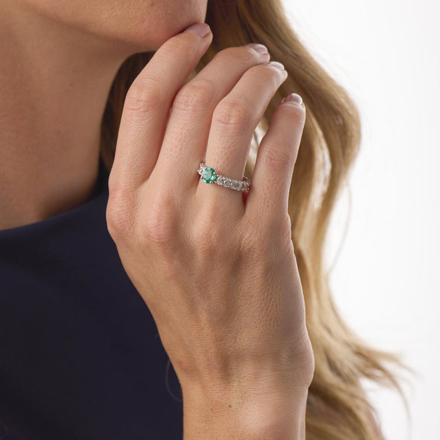Lugano GIA Brazilian Paraiba tourmaline diamond 18k white gold wedding band is an extraordinary modern design showcasing...