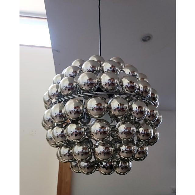 Beautiful pendant lamp by Kare Design. Germany, 1980s. Chrome-plated metal frame. It supports chrome-plated plastic...