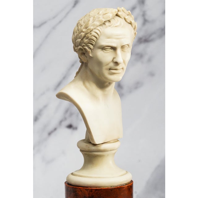 A distinguished tribute to one of history's most legendary figures, this handsome vintage bust depicts Julius Caesar, the...