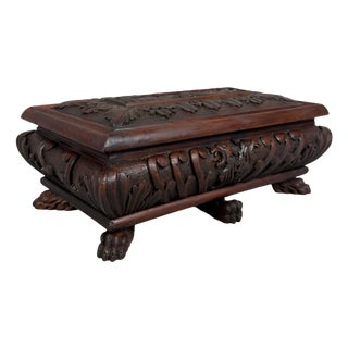 Antique Carved Wooden Chest with Mythological Creatures and Lion Feet, 20th Century For Sale