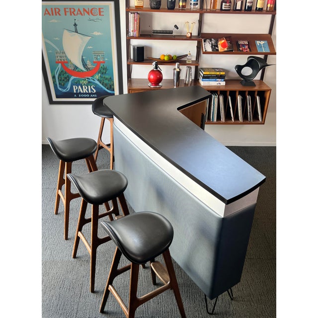 A statement piece. This bar inspired by the Mid-century Modern era is designed and handcrafted in California. The bar...