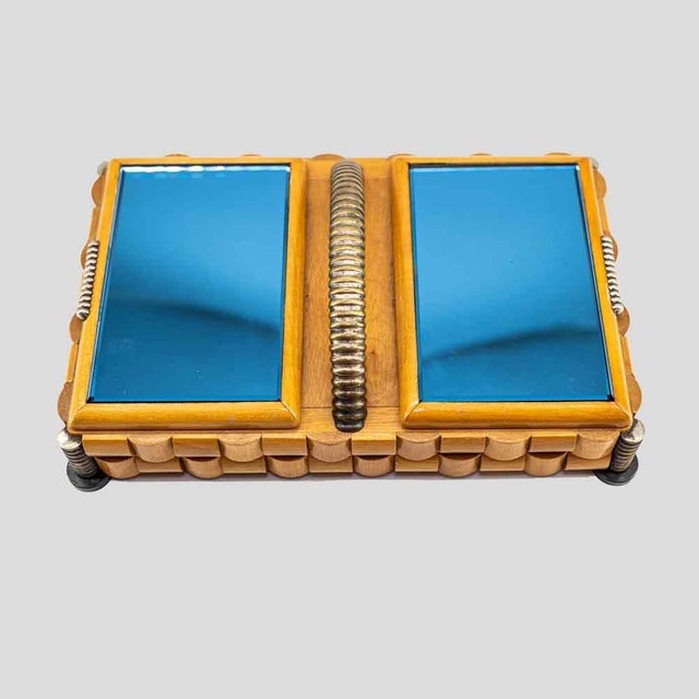 A vintage wooden box , brass metal stand with a brass handle, and 2 blue mirror on wood openings. Italian design ca 1930...