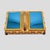 A vintage wooden box , brass metal stand with a brass handle, and 2 blue mirror on wood openings. Italian design ca 1930...
