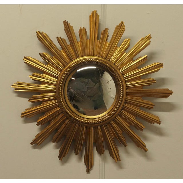 Mid Century French Art Deco Style Sunburst Gilt Convex Mirror A Lovely dainty piece, the sunburst rays radiate out, the...