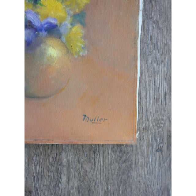 Mid 20th century oil on canvas floral still life painting with yellow flowers and purple Iris. Signed Muller lower right...