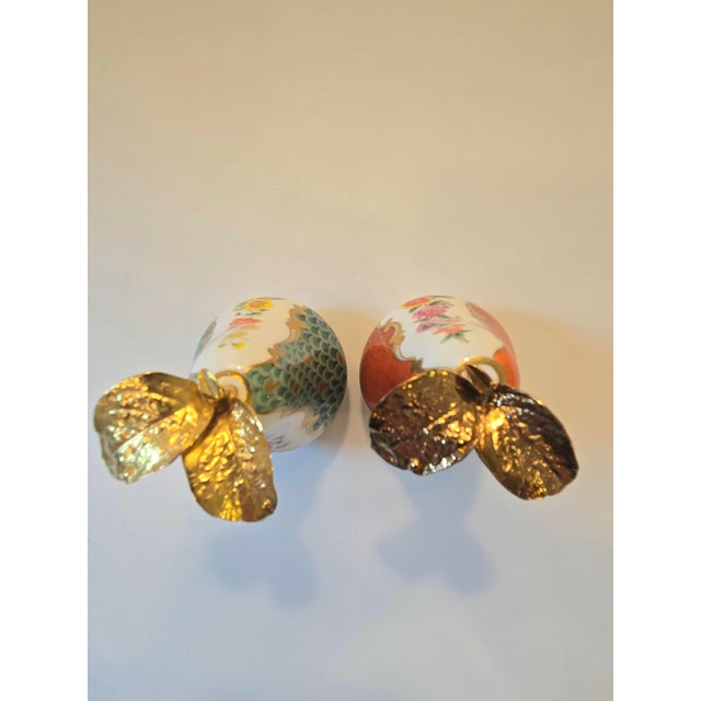 A delightful and highly collectible pair of vintage fine bone china pear-shaped candle snuffers (candle douters) by the...