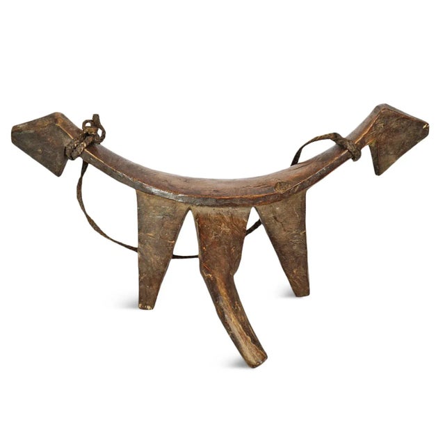 Original vintage carved wood headrest from the Dinka people of Eastern Africa. These headrests which are hand carved from...