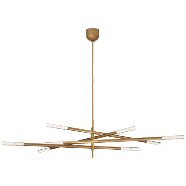 Rousseau Grande Eight Light Articulating Chandelier in Antique-Burnished Brass with Seeded Glass Designer: Kelly Wearstler...