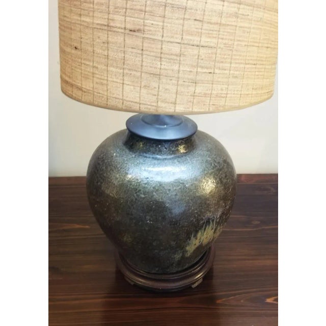 This wonderfully earthy lamp has a lot to offer! Very versatile earthen tones and a gorgeously unique glaze. The color is...