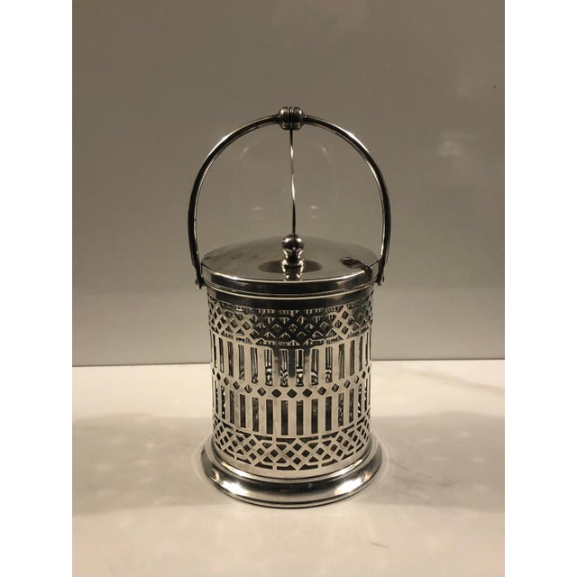 This beautiful antique 1920s Art Deco Silver Pierced Condiment Jar With Lid will be a sophisticated addition to your...