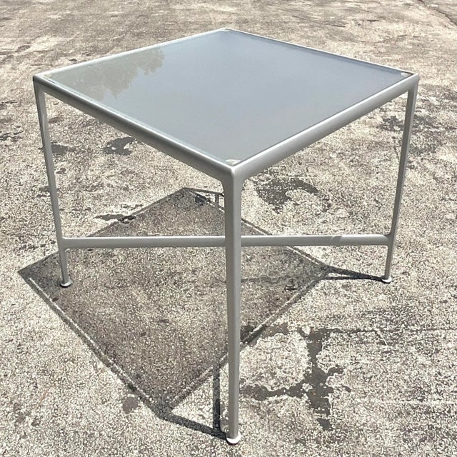 Elevate your outdoor dining experience with the Vintage Boho Richard Schultz High Top Dining Set. Crafted with American...