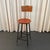 This tall, industrial train station switchboard operator stool was manufactured by the Angle Steel Stool Co. The maker's...