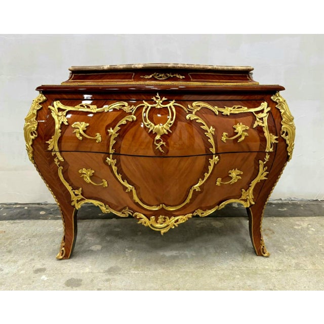 Experience the grandeur of European craftsmanship with this magnificent French Rococo-inspired dresser, masterfully...