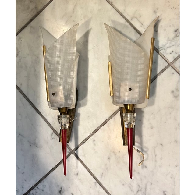 Authentic French vintage wall sconces from the mid-20th century, features a textured opaline white plastic shade with...