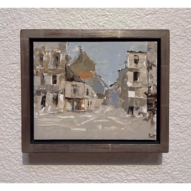 This oil painting captures a tranquil view of a French village, rendered in a palette of soft grays and warm earth tones....