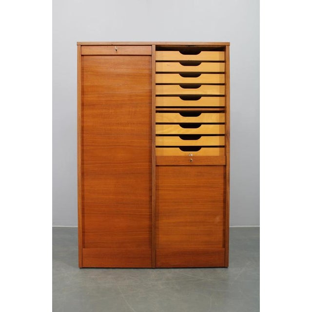 This elegant Mid-Century tambour office cabinet was produced in Denmark during the 1960s and exemplifies the refined...