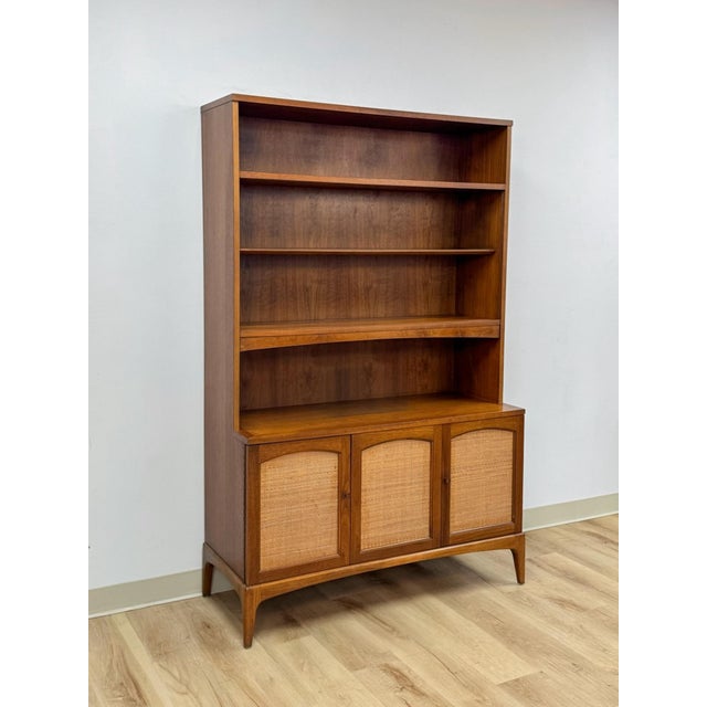 This vintage Lane Rhythm hutch is a tall, collectible mid century modern storage and display piece from one of Lane's most...