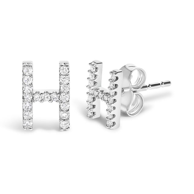 Expertly crafted to symbolize individuality and grace, this exquisite "H" initial stud earring is fashioned from radiant...