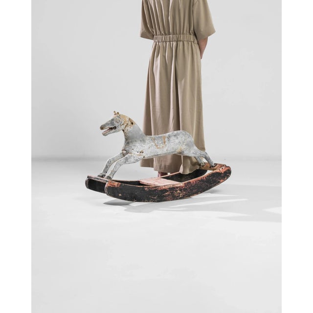 With her mouth open in excitement, with her eyes glowing with enthusiasm, with her sleek body depicted in motion — this...