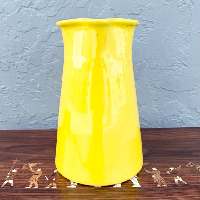 This vintage Italian handmade pottery pitcher brings sunny Mediterranean charm to any space. Crafted with thick, heavy...