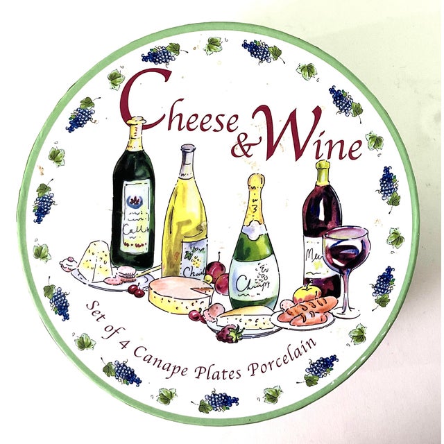 New in the box – set of four porcelain canapé plates-each decorated with a different cheese and wine Made by L Godinger &...