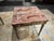 This is a vintage Louis XVI Style marble top side table. The marble features burgundy, rose and blush pink warm toned...