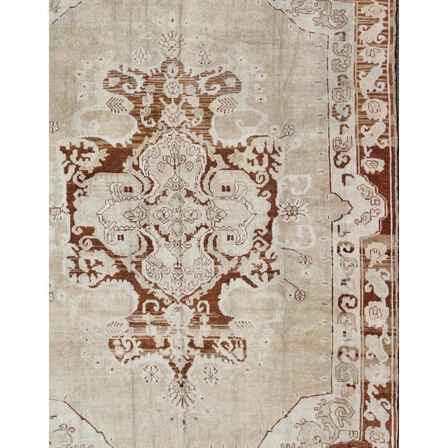 Keivan Woven Arts- Vintage Turkish Carpet With Floral Medallion in Sienna, Mocha, Tan and Bone Colors. This incredible...